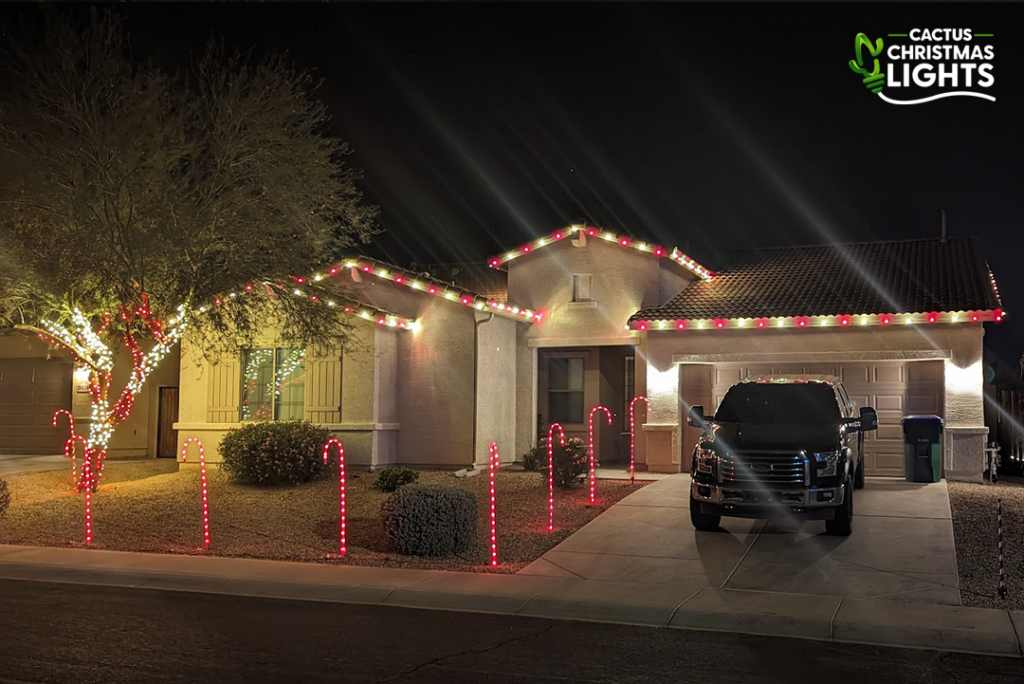 Waddell - Red and White Lights on Roofline and Tree